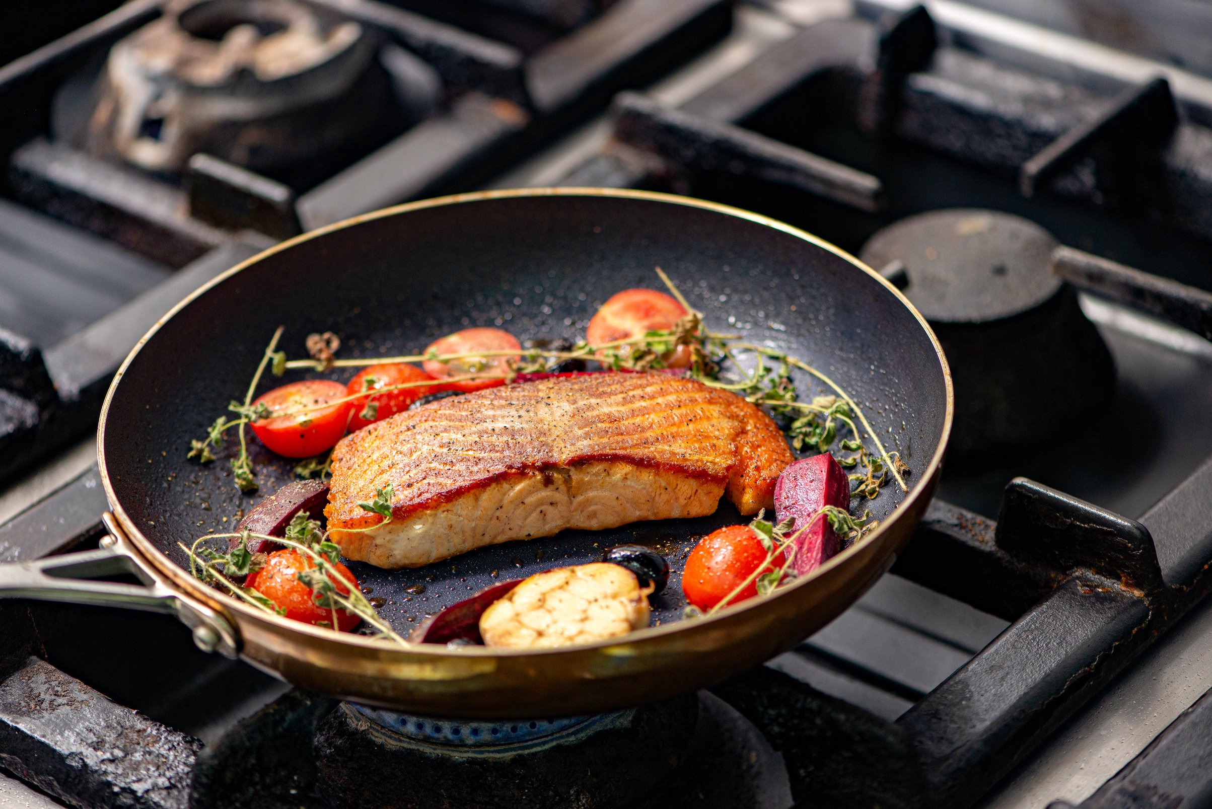 Fine dining, salmon fillet and vegetables.
